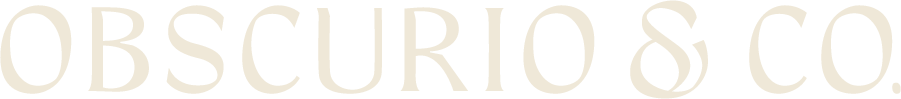 The Obscurio & Co. inline logotype in cream. The unique serif logo features a subtle classical aesthetic.