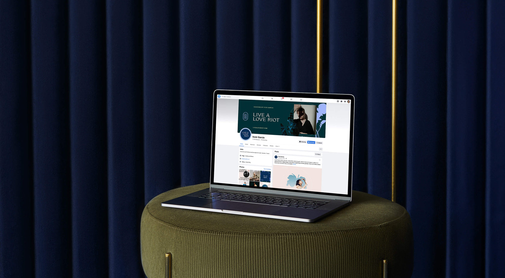 Brand designer portfolio image of the Live A Love Riot Facebook page. A macbook sits in front of a blue curtain and shows the elegant brand photography combining with custom logo design. 