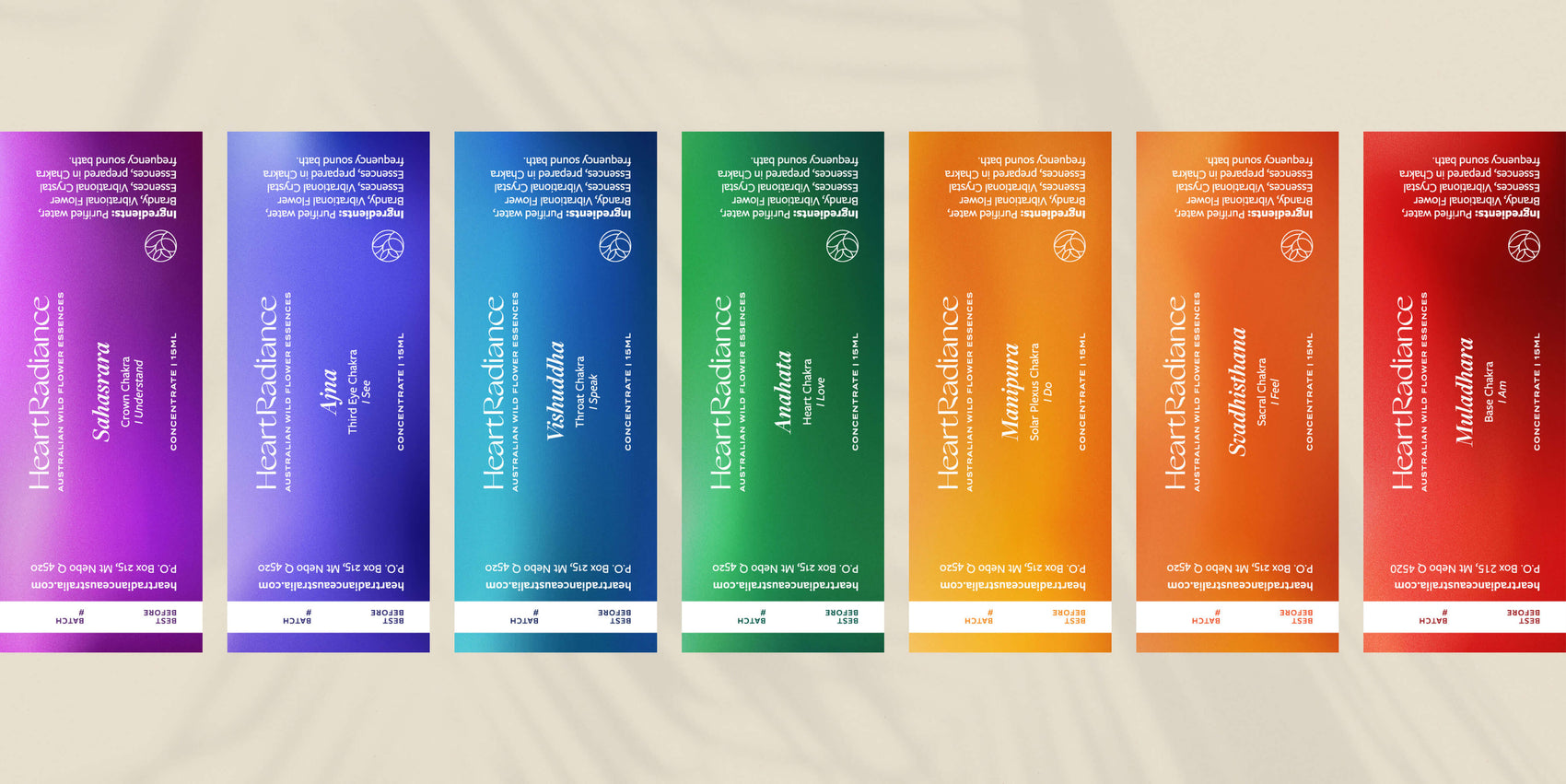 Brand identity case study showing the range of chakra custom product labels for HeartRadiance. Each custom label has its own hazy gradient and features elegant white typography. 