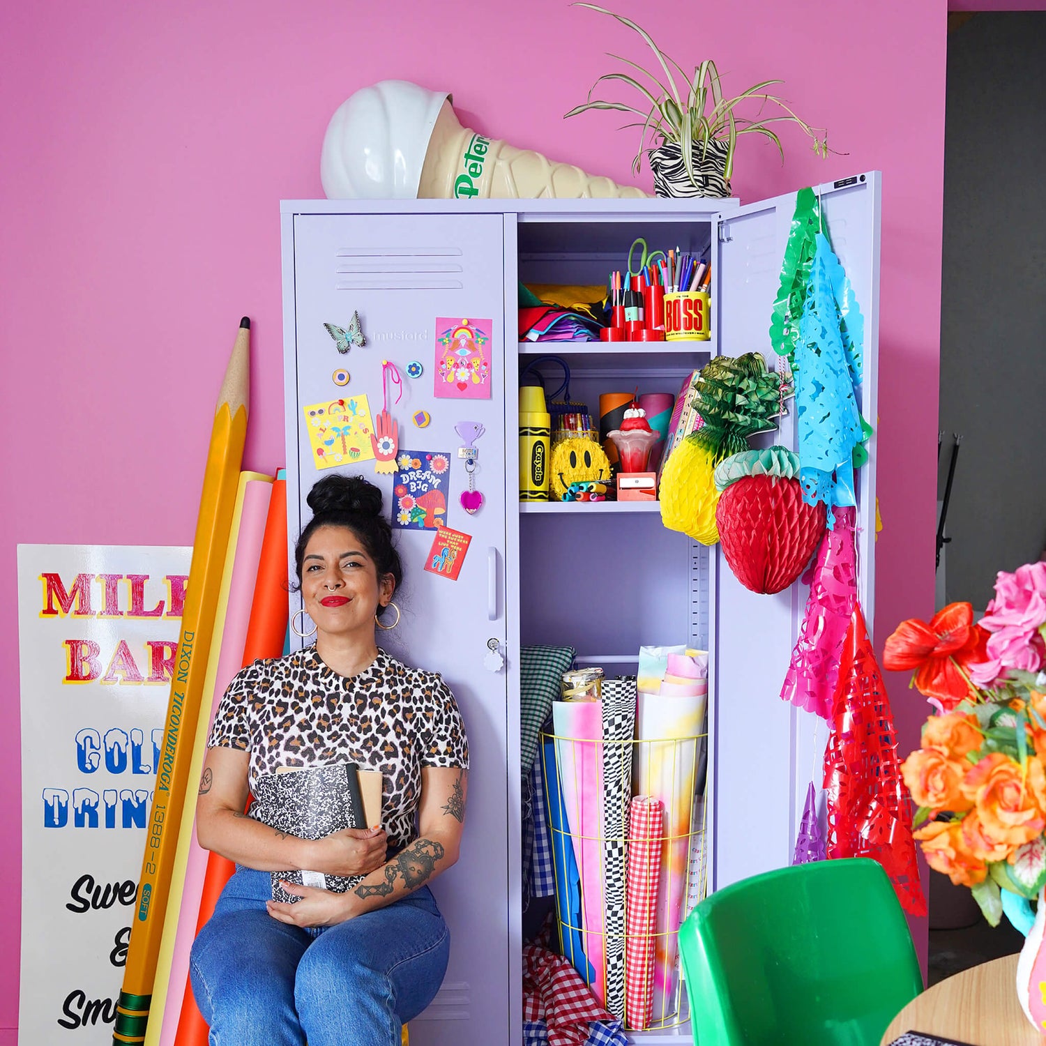 Brand designer portfolio image showing image of Kitiya Palaskas in her studio.