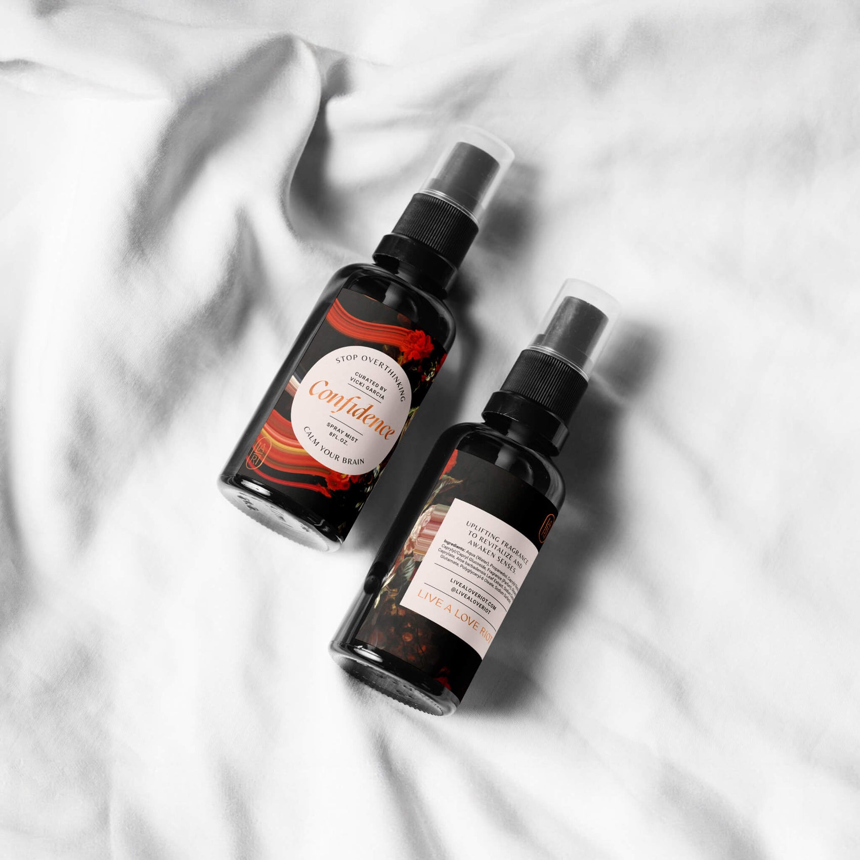 Coach brand design examples image of hypothetical Live a Love Riot room sprays. This speculative design helps to map out the brand potential and help the client visualise end outcomes. 