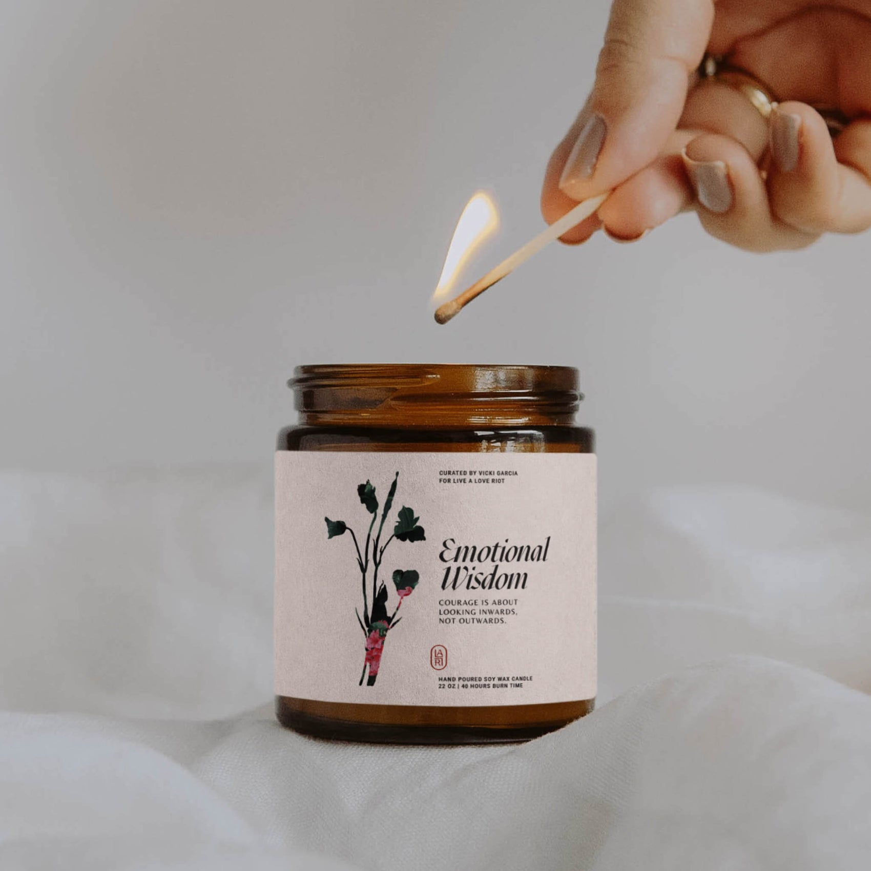 Coach brand design examples image of hypothetical Live a Love Riot candle labels. This speculative design helps to map out the brand potential and help the client visualise end outcomes. 