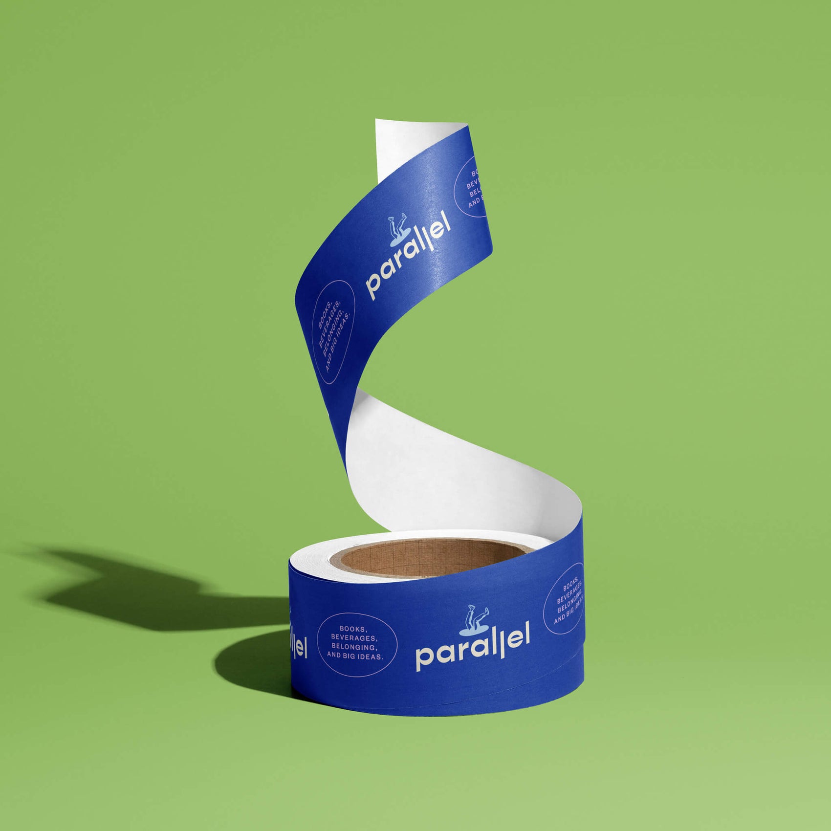 Bookstore brand identity case study image showcasing the Parallel custom tape design. On a deep blue background, the brand logo and supporting icon alternate in purple and light blue.