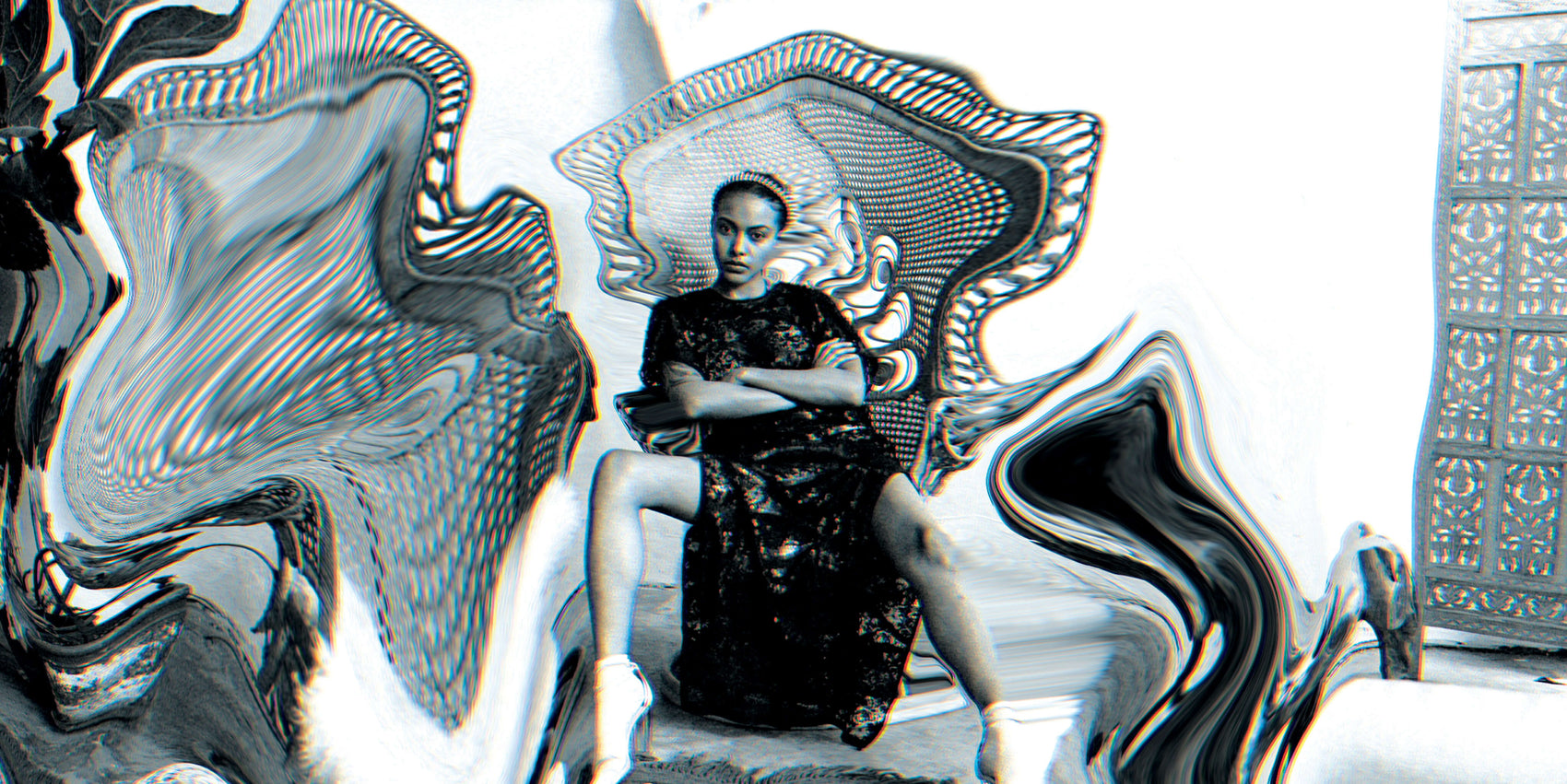 Fashion Branding case studies image of an Uncommon store campaign graphic. A black and white image of a model on a chair has been liquified and manipulated, a glitch aesthetic effect applied. 
