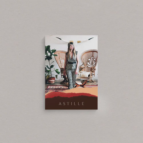 Fashion label brand design examples image of the first Astille model lookbook. The gif showcases the front cover and spreads, all featuring torn paper textures and a warm spice coloured palette. 